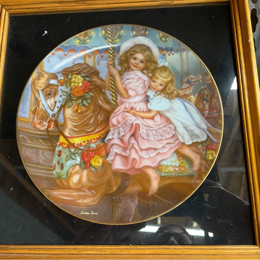 The carousel, china plate, framed